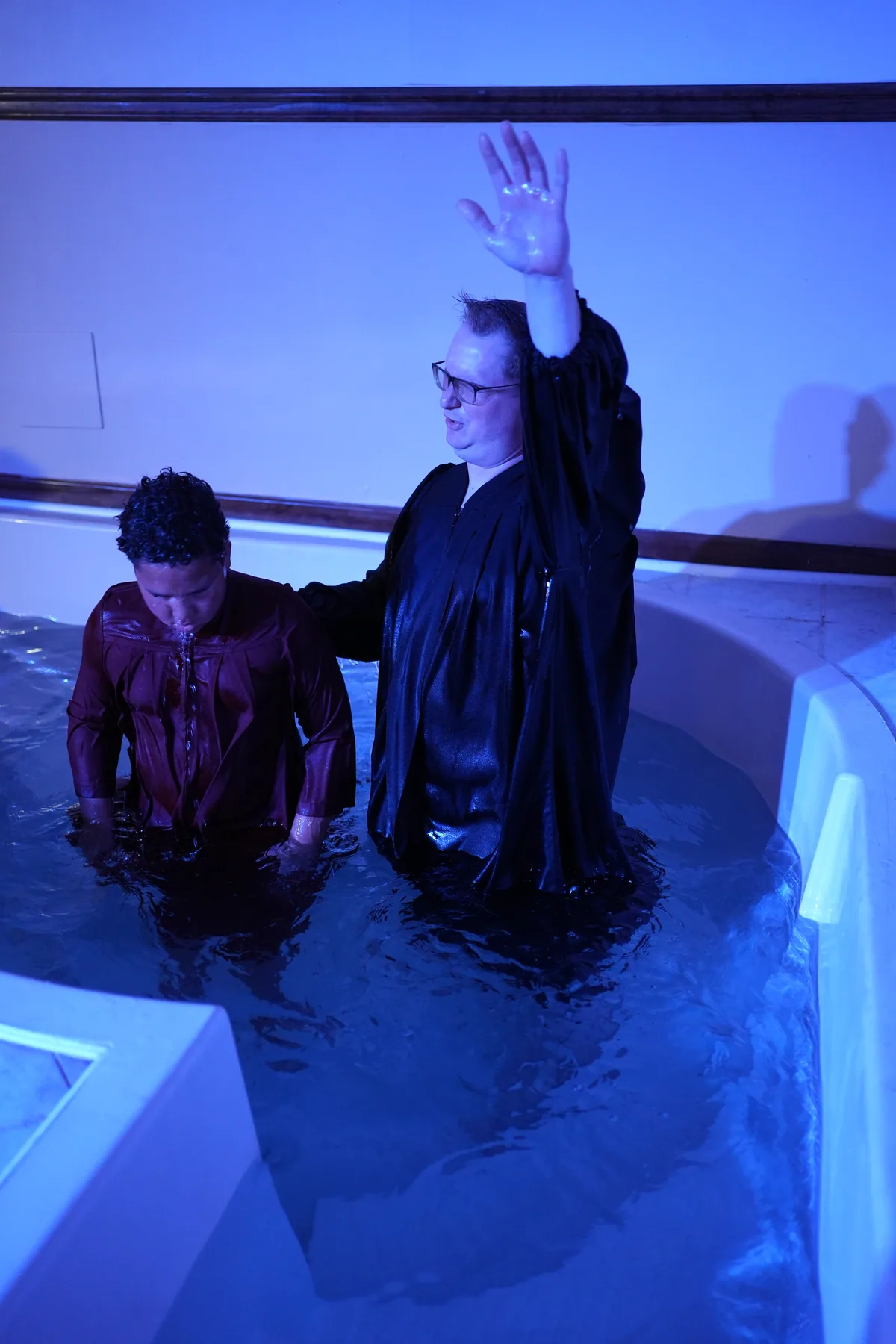 A baptism at Bethel, in the water at the front of the sanctuary